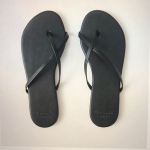 Strappy faux leather flop flops from Abercrombie